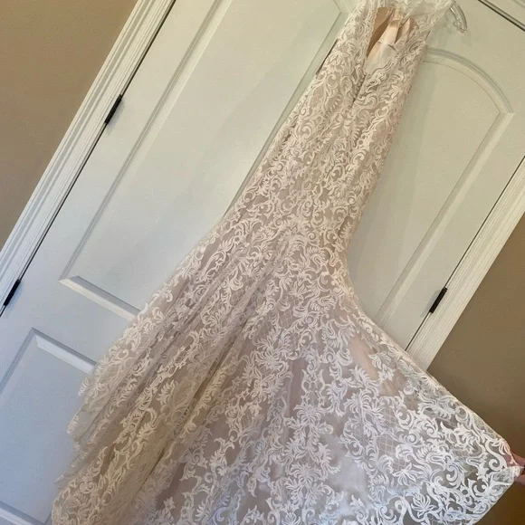Wedding dress. Eddy K. Size 8. Never worn or altered. Tags still on.
